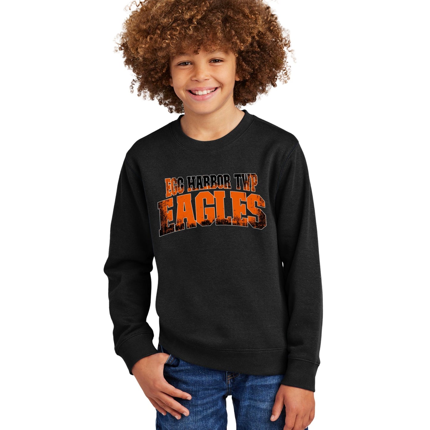 Child wearing a black sweatshirt with Egg Harbor Twp Eagles text